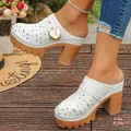 Stylish white chunky high heel platform mules featuring hollow-out floral patterns - 36 / White