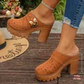 Fashionable tan chunky heel mules featuring floral laser-cut design and a 9.5cm platform - Orange