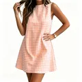 Detail view of sleeveless round neck gingham summer dress in orange and white. - S / Dresses / Orange