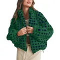 Close-up detail of the green and navy checkered sherpa fleece jacket on a model - Green Cyan Plaid