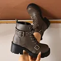 Detail view of brown chunky heel platform boots with rivets and buckles. - 35 / Light Gray