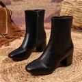 Elegant black pointed-toe leather ankle boots with side zipper and block heel. - 38 / Black PU