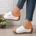 Detailed view of stylish white peep toe platform wedge sandals with thick brown soles - 36 / White