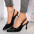 Close-up of black crocodile-textured pointed-toe slingback heels with buckle strap - 38 / Black Snake Pattern (2605-1)