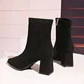 Close-up side view of elegant black suede block heel ankle boots with side zipper. - 35 / Black