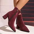 Close-up of burgundy suede ankle boots with block heel and pointed toe - 35 / Burgundy