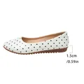 Women's chic white ballet flats featuring black polka dot pattern and comfortable soft sole - 35 / White