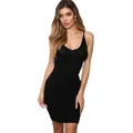 Elegant detail of a sexy black ribbed knit bodycon dress with a deep V-neckline on a model - S / Black
