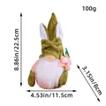 Green Easter bunny gnome plush doll with detailed size and weight dimension markings - Holding Green Leaf Pink Flower