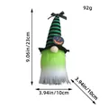 Handmade Halloween mini plush gnome featuring green striped wizard hat and pumpkin decoration - Pumpkin Pattern / Green