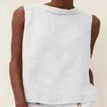 Detail view of a white linen sleeveless casual top featuring an elegant round neckline - White