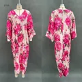 Elegant pink floral print maxi dress featuring loose fit and long sleeves for summer wear - S / Dresses / Pink