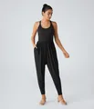 Elegant black sleeveless jumpsuit for women featuring tapered legs and side pockets - S / Black
