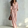 Elegant pink deep V-neck wide-leg jumpsuit with waist tie belt and flared sleeves detail - S / Set / Pink