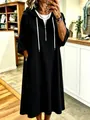 Close-up of waffle knit hooded dress with white drawstrings and zipper detail - S / Dresses / Black