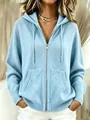 Close-up of a women's light blue zip-up hooded knit cardigan with a loose fit - S / Tops / Sky Blue