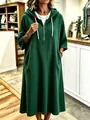Close-up of green waffle texture hooded dress with half-zip and drawstring - S / Dresses / Green