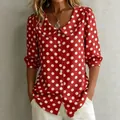 Détail de chemisier rouge à pois blancs avec col Claudine et manches bouffantes. - S / Hauts / Rouge