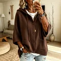 Detailed close-up showing the soft brown knitted texture and buttons of this hooded cardigan. - Dark Brown