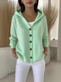 Elegante mintgroene gebreide cardigan met capuchon, bruine knopen en een casual damesstijl - Groen