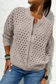 Detailed view of a stylish beige hollow-out knit cardigan with a silver front zipper closure. - S / Tops / Khaki