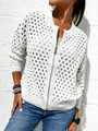 Detailed macro view of white hollow-out knit pattern on a casual women's zipper jacket - White