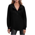 Detailweergave van de zwarte damestop met lange mouwen en stijlvolle henley-knoopsluiting. - S / Tops / Zwart