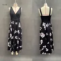 Front and back detail of V-neck floral print sleeveless maxi dress on mannequin - Black