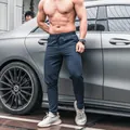Men's quick-dry athletic training pants in navy blue slim fit design for gym workout - Navy Blue