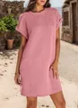 Close-up showing the textured fabric and rolled cuffs of the pink short sleeve dress - S / Dresses / Pink