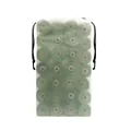 Detailed view of green biodegradable dog poop bag rolls in a frosted drawstring storage bag - Frosted Storage Bag Style / 28 Rolls (Thickened Frosted Bag) / Green With Black Bone Pattern