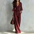 Elegant burgundy deep V-neck wide-leg jumpsuit with bell sleeves and waist tie - S / Set / Burgundy