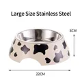 Detailed view of large cow print pet bowl with stainless steel inner, 22cm diameter size - With Stainless Steel Inner / L / White