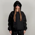 Close-up detail of black oversized hoodie featuring a unique functional built-in eye mask - S / Tops / Black