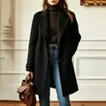 Detailed styling of a black mid-length wool coat with lapel collar and autumn accessories - 3XL / Tops / Black