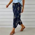 Detail view of retro patterned cotton linen joggers for women with elastic cuffs - S / Navy Blue