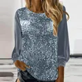 Detailed view of a women's casual silver sequin long sleeve top with grey sleeves. - S / Tops / Gray