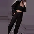 Detailed look at the stylish black sequined three-piece set including jacket, top, and pants. - XS / Top And Bottom / Black