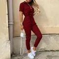 Full-length view of a burgundy short-sleeve jumpsuit with a high-waist belt - M / Set / Red