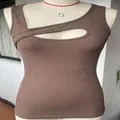 Detail view of brown ribbed sleeveless tank top with chest cutout on mannequin - Coffee