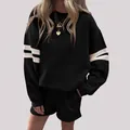 Casual two-piece black oversized sweatshirt and shorts set with white stripes on sleeves - S / Top And Bottom / Black