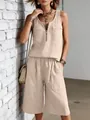 Stijlvolle beige dames linnen set bestaande uit mouwloze top met halve rits en wijde shorts - S / Boven- En Onderstuk / Broken Wit