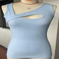 Detail view of a light blue ribbed sleeveless top featuring a stylish chest cutout design - Light Blue