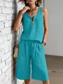 Turquoise tweedelige set met mouwloos vest met halve rits en korte wijde broek - S / Boven- En Onderstuk / Meerblauw