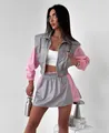 Full view of women's grey and pink color-block zip-up jacket and matching skirt set. - S / Top And Bottom / Gray