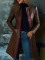 Detailed close-up of a women's retro brown long leather coat with red piping - S / Tops / Coffee