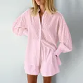 Full view detail of a pink jacquard textured shirt and matching shorts set with puff sleeves - S / Top And Bottom / Pink