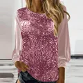 Detailansicht eines lila Langarm-Oberteils für Damen mit schimmernden Pailletten vorne. - S / Oberteile / Rosa