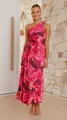 Detail view of a vibrant pink floral one-shoulder pleated maxi dress with waist cutout detail - S / Dresses / Red