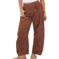 Close-up of brown corduroy wide-leg pants showing texture and high waist detail - Caramel color